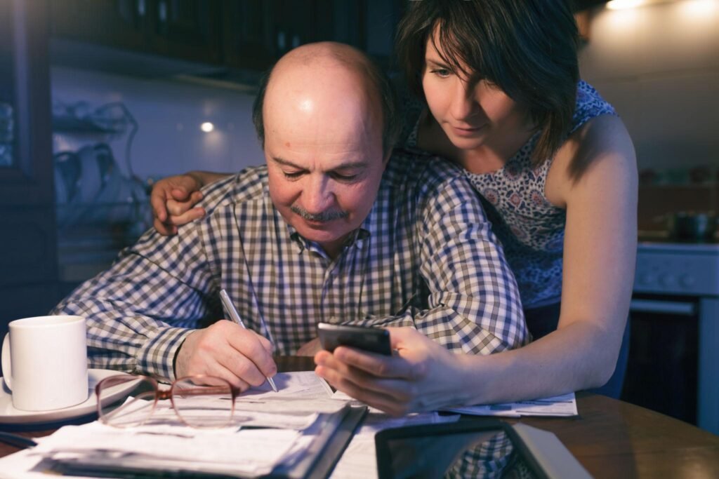Parent teaching financial planning basics for kids using real examples of saving, investing, and budgeting